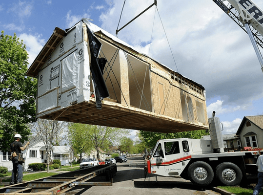 Modular home being moved to site. Credit: Winona Daily News.