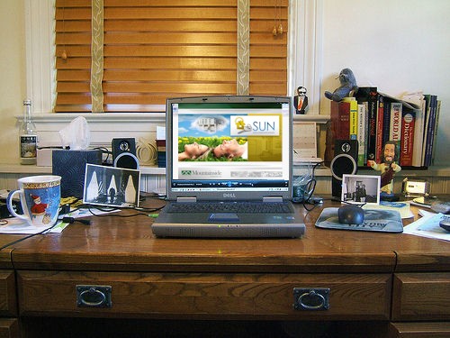 Laptop on desk photo credit tonythemisfit posted inspiration blog mhpronews com 