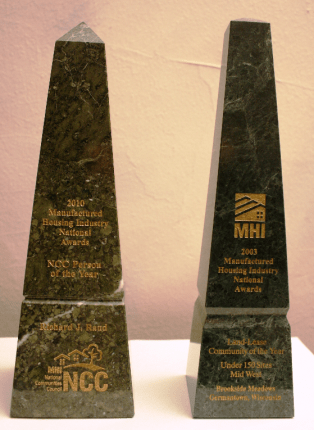 Rick rand national communities council person of year 2010 mhi land lease community of year 2003 awards posted manufaturred housing pro news 